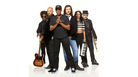 Arsenio Hall with his band. Robin DiMaggio stands to the right of Arsenio. Arsenio Hall with his band. Robin DiMaggio stands to the right of Arsenio.