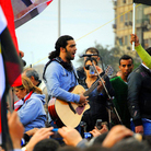Egyptian singer-songwriter Ramy Essam, in the heady early days at Tahrir Square in 2011. Egyptian singer-songwriter Ramy Essam, in the heady early days at Tahrir Square in 2011.