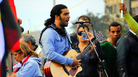 Egyptian singer-songwriter Ramy Essam, in the heady early days at Tahrir Square in 2011. Egyptian singer-songwriter Ramy Essam, in the heady early days at Tahrir Square in 2011.