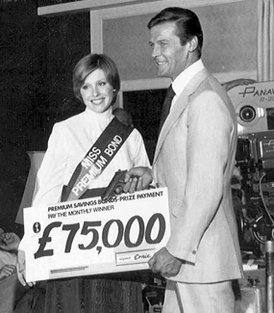 Actor Roger Moore, who played James Bond, poses for a photo promoting Britain's Premium Bonds program. Actor Roger Moore, who played James Bond, poses for a photo promoting Britain's Premium Bonds program.