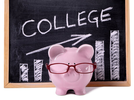 Pink piggy bank with glasses standing in front of a blackboard with simple college savings chart.