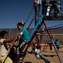 Children play near a border fence at the Escuela Primaria Federal Profesor Ramon Espinoza Villanueva, a primary school in Palomas, Mexico. Palomas borders Columbus, N.M., its sister village. Children play near a border fence at the Escuela Primaria Federal Profesor Ramon Espinoza Villanueva, a primary school in Palomas, Mexico. Palomas borders Columbus, N.M., its sister village.