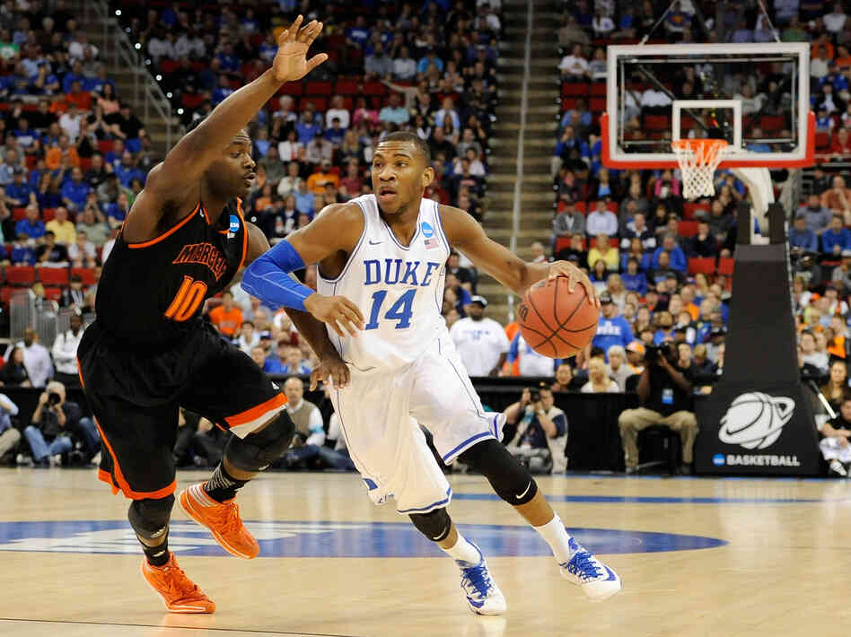 Duke's Rasheed Sulaimon drives to the basket against Mercer's Ike Nwamu. Duke's Rasheed Sulaimon drives to the basket against Mercer's Ike Nwamu.