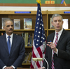 Education Secretary Arne Duncan, right, and Attorney General Eric Holder, appeared at a Washington, D.C., elementary school and said schools need to reduce "unnecessary and unfair school discipline practices and other barriers to equity and opportunity at all levels of education."