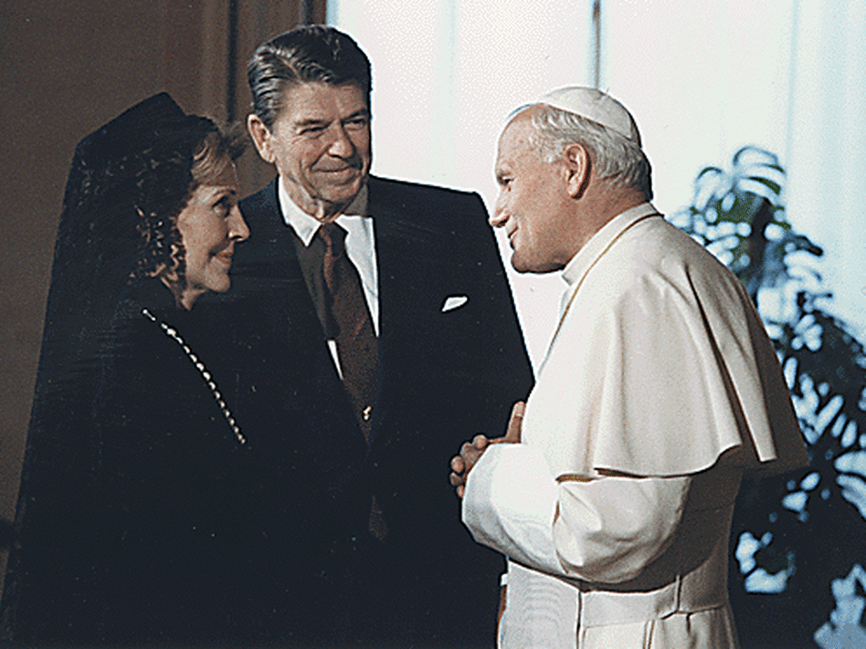 President Ronald Reagan and Nancy Reagan meet Pope John Paul II at the Vatican in June 1982. Reagan and the pope shared a strong opposition to communism. President Ronald Reagan and Nancy Reagan meet Pope John Paul II at the Vatican in June 1982. Reagan and the pope shared a strong opposition to communism.