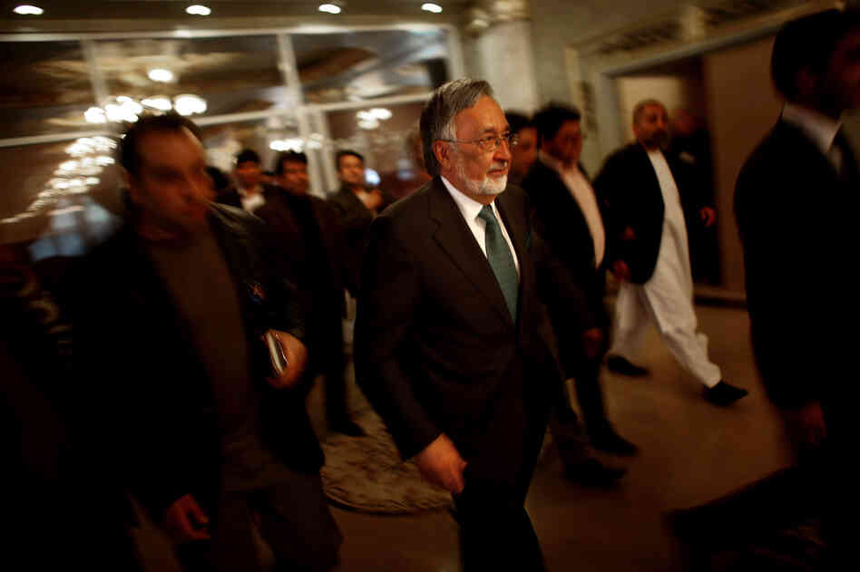 Dr. Zalmay Rassoul walks through the lobby of the Intercontinental Hotel in Kabul during a campaign event. Rassoul is a former foreign minister and is one of leading candidates. Dr. Zalmay Rassoul walks through the lobby of the Intercontinental Hotel in Kabul during a campaign event. Rassoul is a former foreign minister and is one of leading candidates.