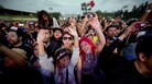 Fans of Mexican rockabilly band Rebel Cats watch a performance during the fourth day of the Vive Latino music festival. Fans of Mexican rockabilly band Rebel Cats watch a performance during the fourth day of the Vive Latino music festival.
