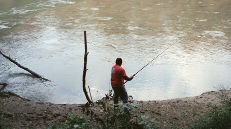 Frank Cedillo fishes in a Greenville, Tenn., lake.