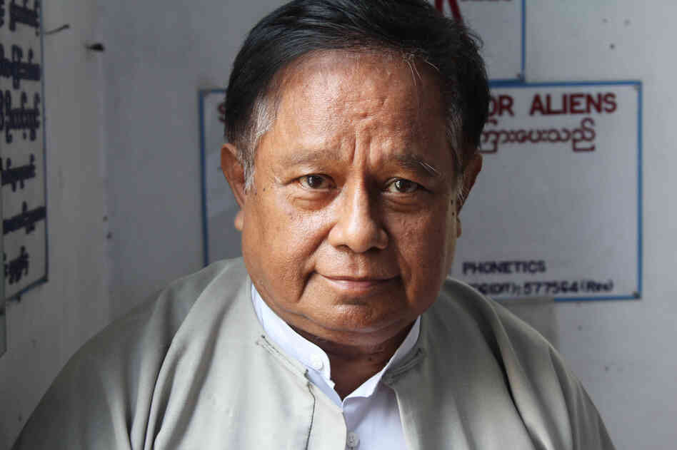 Tint Lwin teaches English in Yangon's colonial urban core. He worries that the building where he works, which dates to 1906, could fall apart if it isn't repaired in the next few years.