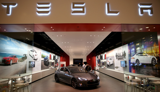 Tesla stores, like this one in Miami, sell cars directly to customers, bypassing dealerships. Tesla has had to fight to keep its stores open in some locations, most recently in New Jersey. (Image credit: Getty Images)