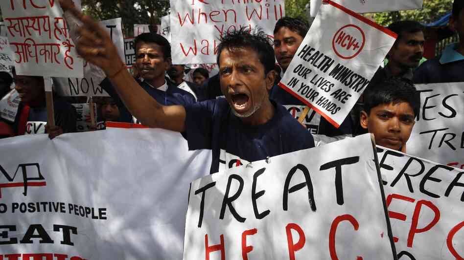 Advocates demonstrate in favor of cheaper generic drugs to treat hepatitis C in New Delhi on March 21. The disease is common among people who are HIV positive. Advocates demonstrate in favor of cheaper generic drugs to treat hepatitis C in New Delhi on March 21. The disease is common among people who are HIV positive.