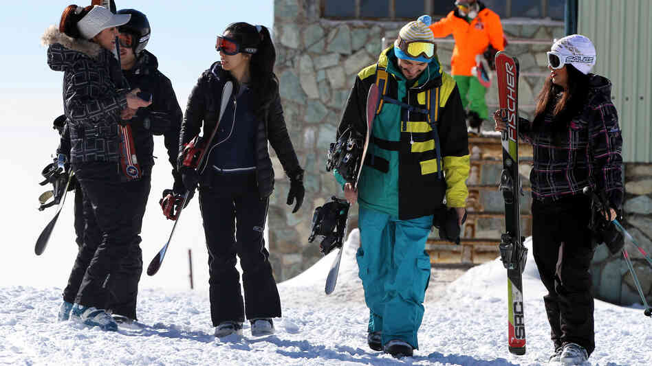Skiers at a resort in the Alborz mountains near the capital Tehran in January. Men and women used to ski separately in Iran. In recent years, they have been skiing together, though it is not formally authorized. Skiers at a resort in the Alborz mountains near the capital Tehran in January. Men and women used to ski separately in Iran. In recent years, they have been skiing together, though it is not formally authorized.