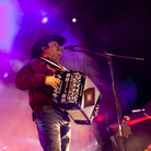 Ricky Munoz, lead singer of Intocalbe, performs in Juarez, Mexico earlier this month. Intocable, a band popular on both sides of the border, is inspired by Mexican music, country hits and rock bands like Def Leppard. Ricky Munoz, lead singer of Intocalbe, performs in Juarez, Mexico earlier this month. Intocable, a band popular on both sides of the border, is inspired by Mexican music, country hits and rock bands like Def Leppard.