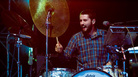 Sean Carey, who writes and records as S. Carey, performing live with Bon Iver. Sean Carey, who writes and records as S. Carey, performing live with Bon Iver.