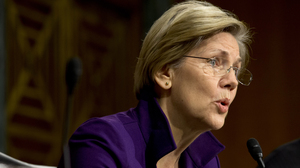Sen. Elizabeth Warren, D-Mass., at a hearing of the Senate Banking, Housing and Urban Affairs Committee last year. Her book, A Fighting Chance, comes out next week.