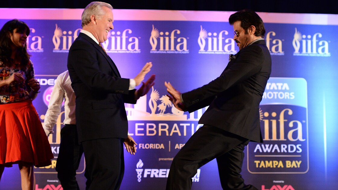 Bollywood star Anil Kapoor (right) engages the mayor of Tampa Bob Buckhorn in a dance during a press conference for the 15th International Indian Film Academy (IIFA) Awards in Tampa, Fla., on Thursday.