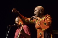 Kidjo describes her latest album, Eve, as "a remembrance of the African women I grew up with, and a testament to the pride and strength that hide behind the smile that masks everyday troubles."