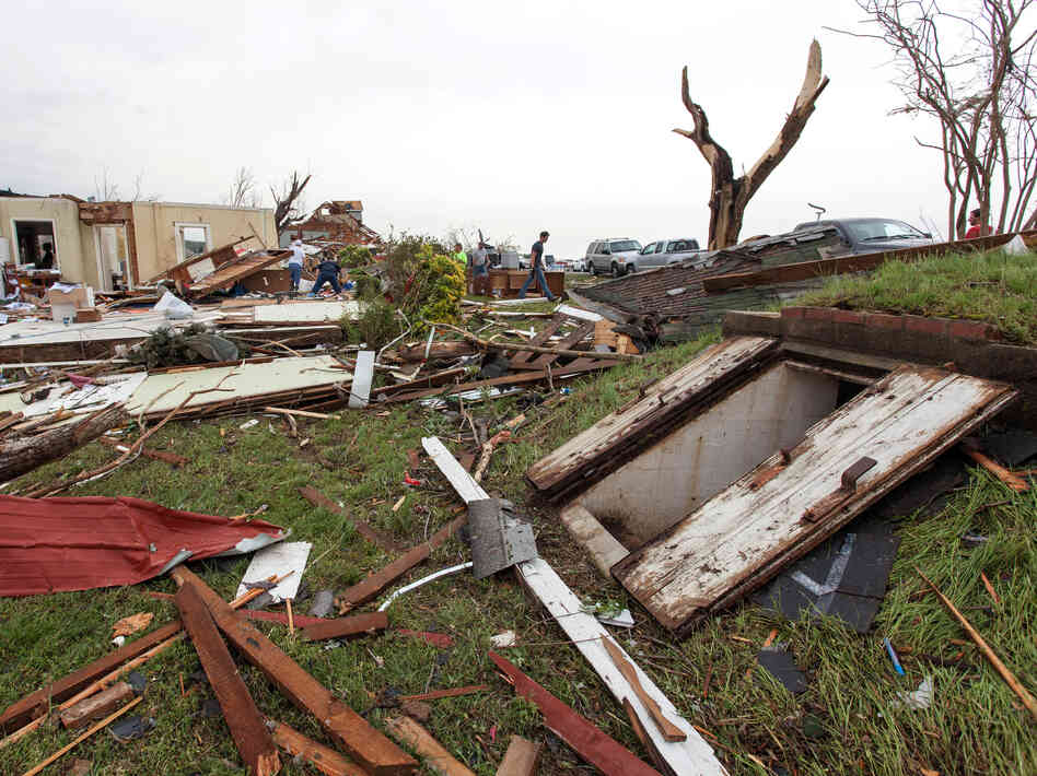 Tornadoes killed at least 17 people on Sunday and Monday. But some managed to stay safe in underground shelters like the one at right in Vilonia, Ark. Tornadoes killed at least 17 people on Sunday and Monday. But some managed to stay safe in underground shelters like the one at right in Vilonia, Ark.