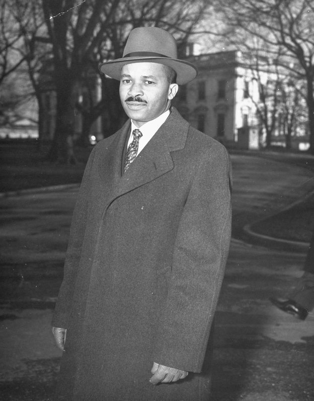 Reporter Harry McAlpin leaves the White House in 1944. McAlpin was the first black reporter to cover a presidential press conference. He'll be honored Saturday at the Correspondents' Dinner. (Image credit: Time & Life Pictures/Getty Image)
