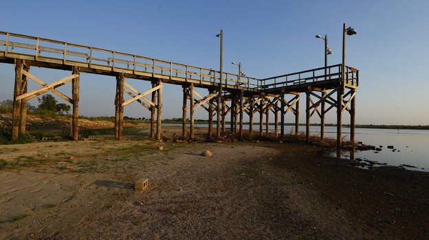 After three years of drought, the water has receded from a dock at Lake Arrowhead State Park near Wichita Falls, Texas.