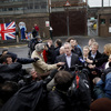 Sinn Fein's Gerry Kelly speaks to the media outside Antrim's police station in Antrim, Northern Ireland, Sunday. Police released Sinn Fein leader Gerry Adams after five days of questioning him about the 1972 murder of Jean McConville. Sinn Fein's Gerry Kelly speaks to the media outside Antrim's police station in Antrim, Northern Ireland, Sunday. Police released Sinn Fein leader Gerry Adams after five days of questioning him about the 1972 murder of Jean McConville.