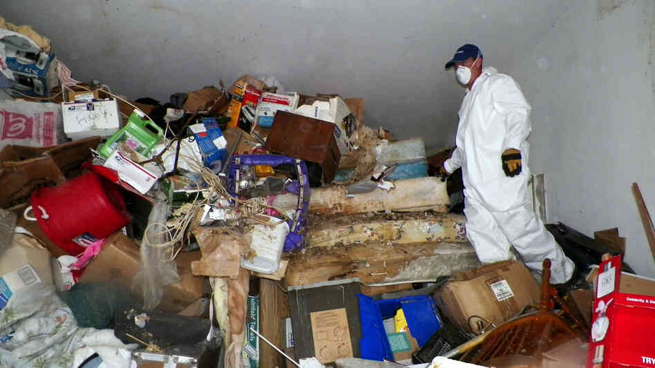 A worker cleans the home of a hoarder in Las Vegas. Teens may not have the time to accumulate this much stuff, but they still have symptoms. A worker cleans the home of a hoarder in Las Vegas. Teens may not have the time to accumulate this much stuff, but they still have symptoms.