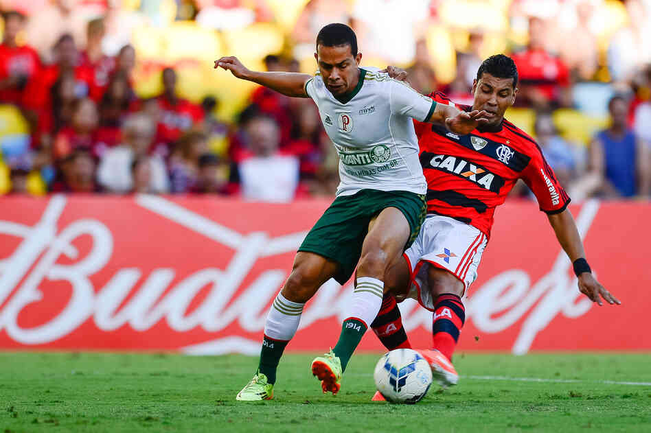 A player from the Brazilian team Palmeiras (left) battles with an opponent from Flamengo in Rio de Janeiro on May 4. Top teams like Palmeiras now recruit and train some young players before they reach their teens. A player from the Brazilian team Palmeiras (left) battles with an opponent from Flamengo in Rio de Janeiro on May 4. Top teams like Palmeiras now recruit and train some young players before they reach their teens.
