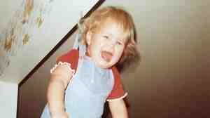 Debra Jenson, 2, hanging from a hook in her grandmother's kitchen. "Over the next 35 years, I watched each of my cousins, then my own children and my cousins' children be dangled from that hook. Between the photo and watching it happen to others, this is a powerful 'fake memory' for me."