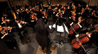 The 85 musicians in the Santa Cecilia Orchestra are paid professionals who play with other symphonies and in Hollywood studios. The 85 musicians in the Santa Cecilia Orchestra are paid professionals who play with other symphonies and in Hollywood studios.