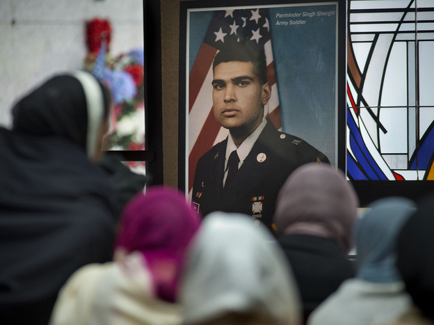 A photograph of Parminder Singh Shergill is displayed during his funeral services Cherokee Memorial Park in Lodi, Calif., on Feb. 8, 2014. (Image credit: Sacramento Bee)