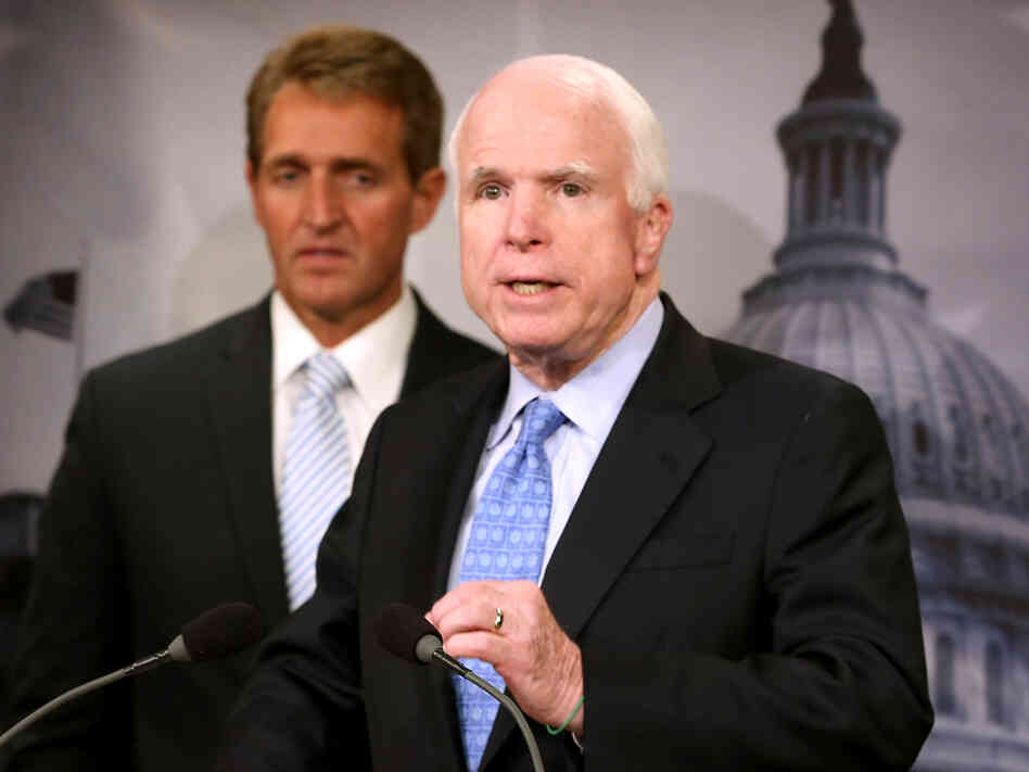 Sen. John McCain discussed the Veterans Choice Act at a news conference on Tuesday, with fellow Arizona Republican Sen. Jeff Flake. Sen. John McCain discussed the Veterans Choice Act at a news conference on Tuesday, with fellow Arizona Republican Sen. Jeff Flake.