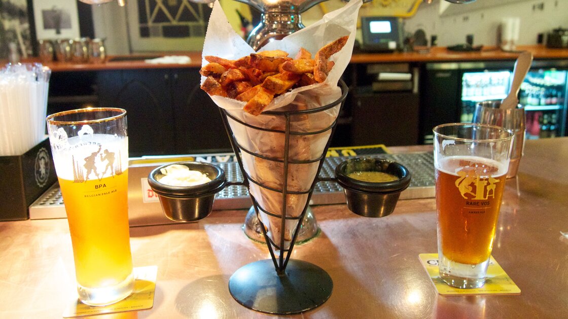 Tuesday afternoon's match between the U.S. and Belgium will pit two countries with burgeoning beer scenes — and a shared love of fries. Tuesday afternoon's match between the U.S. and Belgium will pit two countries with burgeoning beer scenes — and a shared love of fries.