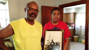 Steven Clark says even though he's learned plenty from his teachers at Urban Prep, his father, Allen, is his biggest role model. The family has a personal connection to civil rights history: Allen holds a picture that shows his cousin, gospel singer Mahalia Jackson, singing at the Lincoln Memorial during the 1963 March on Washington.