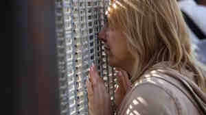 Families communicated through a border fence at San Diego's Friendship Park Nov. 17. On weekends, people on the American side are allowed to to visit, under U.S. Border Patrol supervision, with family and friends in Mexico.