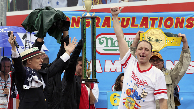 He chowed down 61 in 10 minutes. 61! That's 23,790 calories, in case you're counting. (AP)