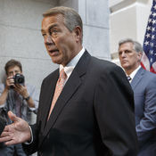 Speaker of the House John Boehner, R-Ohio, with incoming Majority Leader Rep. Kevin McCarthy, R-Calif., and Rep. Lynn Jenkins, R-Kan., talks with reporters on Wednesday about House Republican plans to deal with the border crisis.