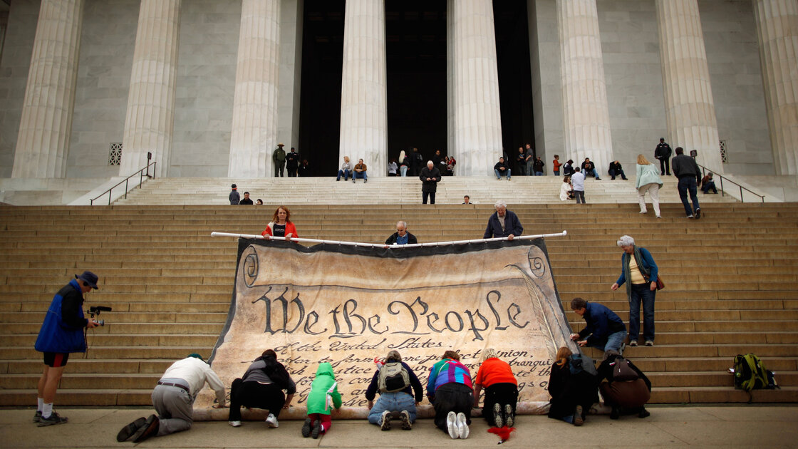 Volunteers at the Lincoln Memorial help roll up a giant banner printed with the Preamble to the Constitution during an October 2010 demonstration against the Supreme Court's Citizens United ruling. Volunteers at the Lincoln Memorial help roll up a giant banner printed with the Preamble to the Constitution during an October 2010 demonstration against the Supreme Court's Citizens United ruling.