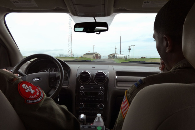 Lt. Raj Bansal and Capt. Joseph Shannon (right) approach Foxtrot-01, a remote nuclear missile base in Nebraska. (Image credit: NPR)