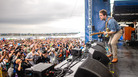 Taylor Goldsmith of the band Dawes performs at the 2014 Newport Folk Festival. Taylor Goldsmith of the band Dawes performs at the 2014 Newport Folk Festival.
