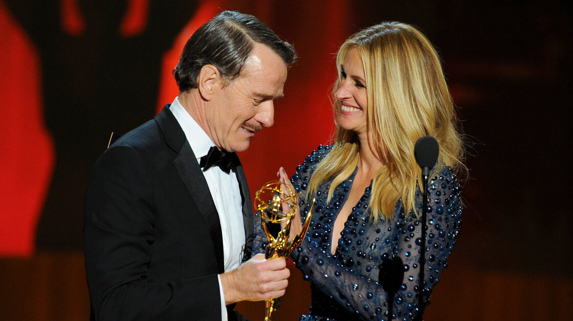 Julia Roberts presents Bryan Cranston with the award for outstanding lead actor in a drama series for his work in Breaking Bad.