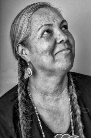 Red Corn's portraits of smiling Native American people are not "radical," he says. Red Corn's portraits of smiling Native American people are not "radical," he says.