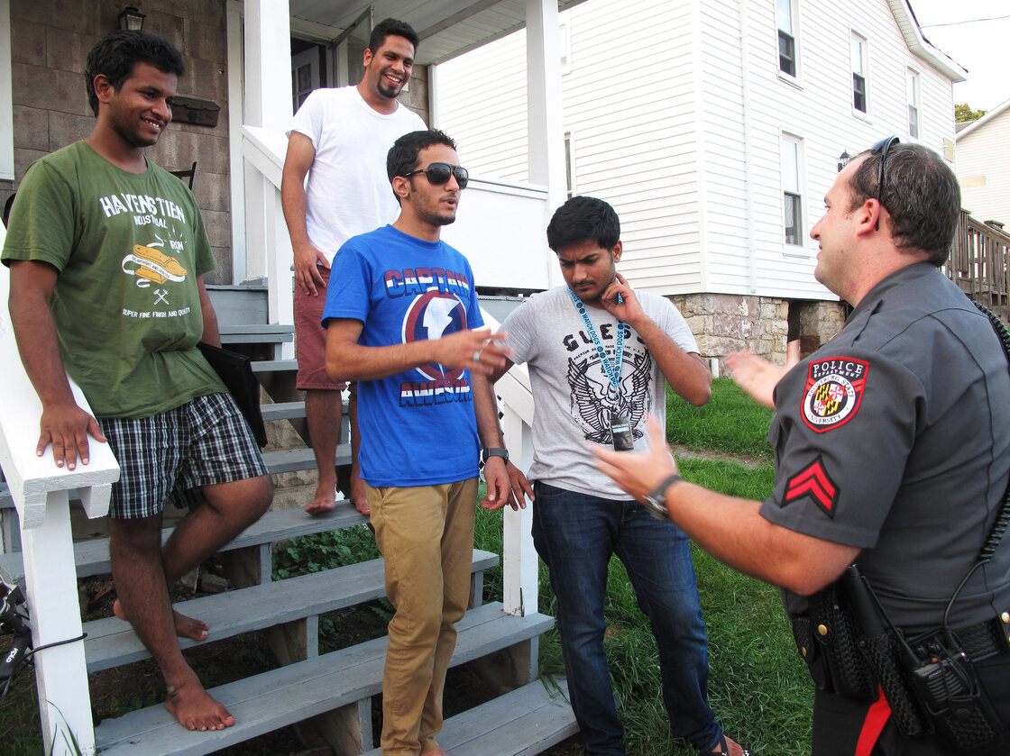 Frostburg State University police officer Derrick Pirolozzi conducts a "knock and talk" at a house near campus, reminding students of laws on underage drinking and open containers. Frostburg State University police officer Derrick Pirolozzi conducts a "knock and talk" at a house near campus, reminding students of laws on underage drinking and open containers.