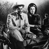 Scarlett O'Hara (Vivien Leigh) and Rhett Butler (Clark Gable) made their film debut in 1939's Gone with the Wind. Scarlett O'Hara (Vivien Leigh) and Rhett Butler (Clark Gable) made their film debut in 1939's Gone with the Wind.