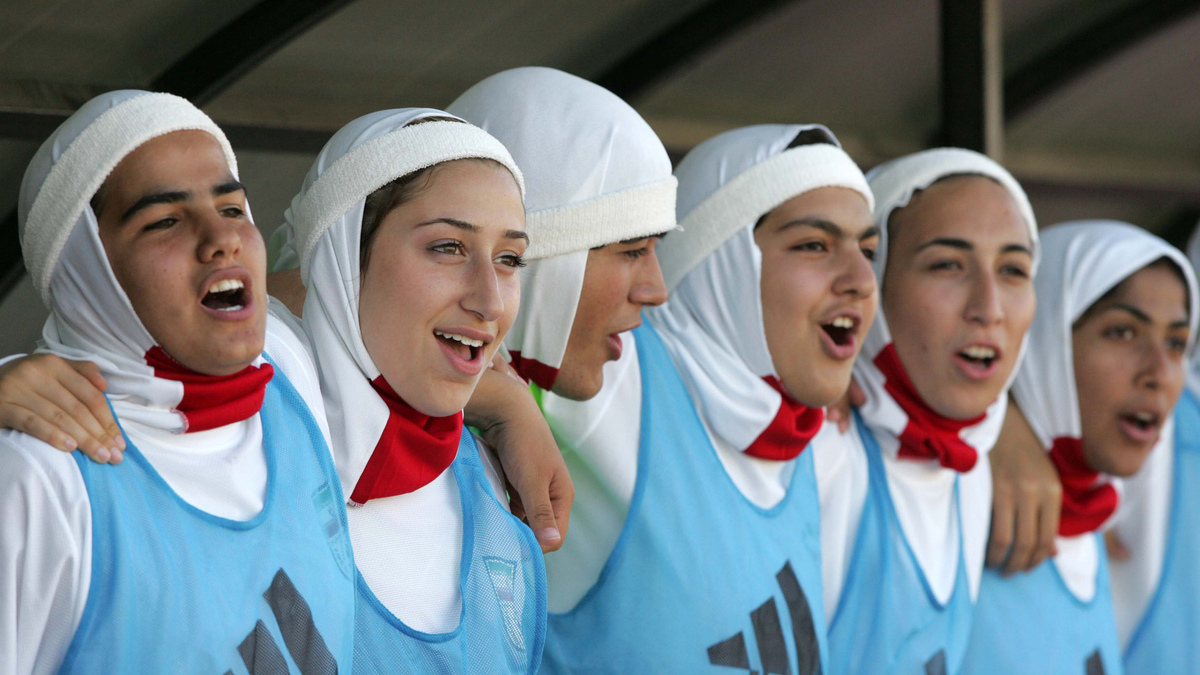 A contentious piece of clothing: Members of the Iranian women's soccer team celebrate their win over Syria back in 2007. That year, the international soccer league FIFA banned the wearing of hijabs during games. The ban was lifted in July.