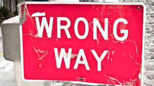 Photo of a "wrong way" sign.