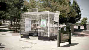 This human-scale lab rat cage is  parked near a skate park in Denver, Colo., to make a point about the lack of science on marijuana.