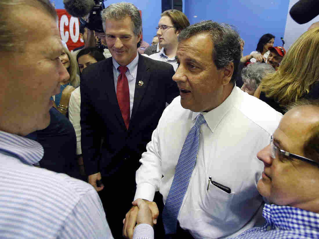 New Jersey Gov. Chris Christie greets supporters at a campaign event for Scott Brown (center left) in Salem, N.H.