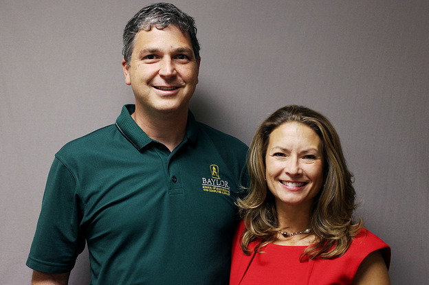 Lori Baker with her husband, Erich. Baker is founder and executive director of the International Consortium for Forensic Identification, Reuniting Families Project. (Image credit: StoryCorps)
