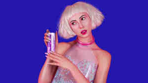 The new collaboration between PC Music's A.G. Cook and affiliated producer SOPHIE is a combination singer and energy drink (neither of which might actually exist) called QT. Seriously.