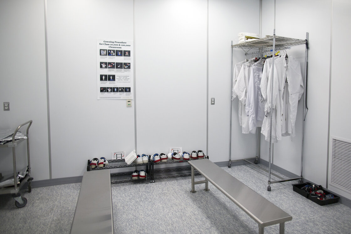 The preparation area for a clean room. Employees change into suits to control contamination. The preparation area for a clean room. Employees change into suits to control contamination.